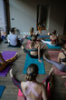 © JAVIER PARDINA/Stocksy - Scenes from a yoga class.