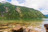 Fototapeta Krajobraz - Cystal clear water of Achensee lake near Pertisau town on sunny summer day, Tirol, Austria
