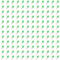 Wall Mural - pattern of green pills on a white background