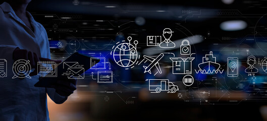 Leinwandbilder - Businesswoman hand using Digital tablet computer of global logistics network distribution and transportation Ui, Smart logistics, Innovation future of transport on blur background.