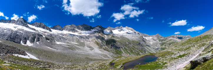 Wall Mural - Mountains and peaks landscape covered with glaciers and snow, natural environment. Hiking in the Dreil�er Tour. Hohe Tauern Austrian Alps, Europe