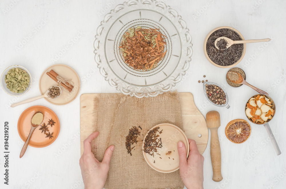 Step by step preparation of masala tea with spices. Step 9- add the ...