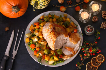 Wall Mural - Roasted sliced turkey breast. Thanksgiving dinner table.  View from above, top view