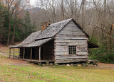 Fototapeta Las - Old Abandoned Wooden House At Cherokee Orchard Road Of Great Smoky Mountains National Park Tennessee On A Cloudy Autumn Day