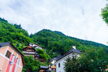 Wall Mural - Colorful houses at picture-postcard view of famous Hallstatt mountain village in the Austrian Alps at beautiful light in autumn at Hallstatt, Austria.