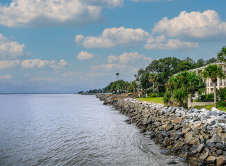 Poster - Condos Behind Stone Seawall on Tropical Coast