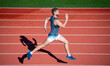 © be free - male sprinter running from start to finish with success and speed, race competition