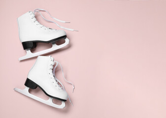 Wall Mural - Pair of skates on color background, flat lay. Space for text