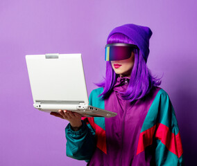 Wall Mural - Style woman in VR glasses and 80s tracksuit with laptop