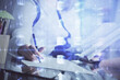© peshkova - Multi exposure of woman's writing hand on background with data technology hud. Big data concept.