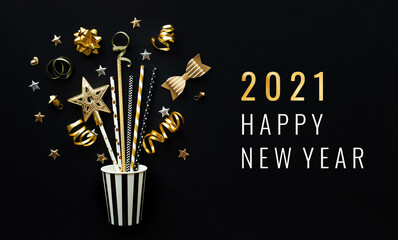 Wall Mural - 2021 happy new year celebration concepts with party ornament in golden color on dark background