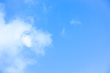 Fototapeta Niebo - White clouds with blue sky Background On a bright day with copy space for text or banner for website