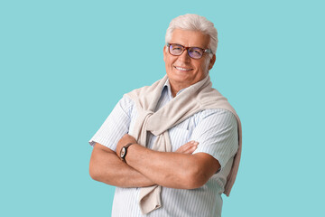 Poster - Stylish senior man on color background