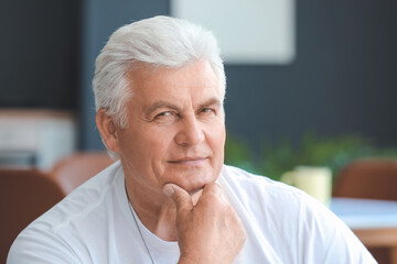 Wall Mural - Portrait of senior man resting at home