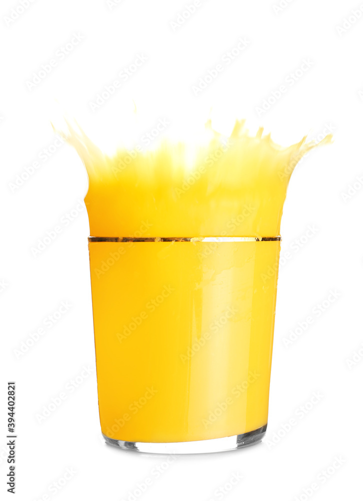 Glass of orange fruit with splashes on white background