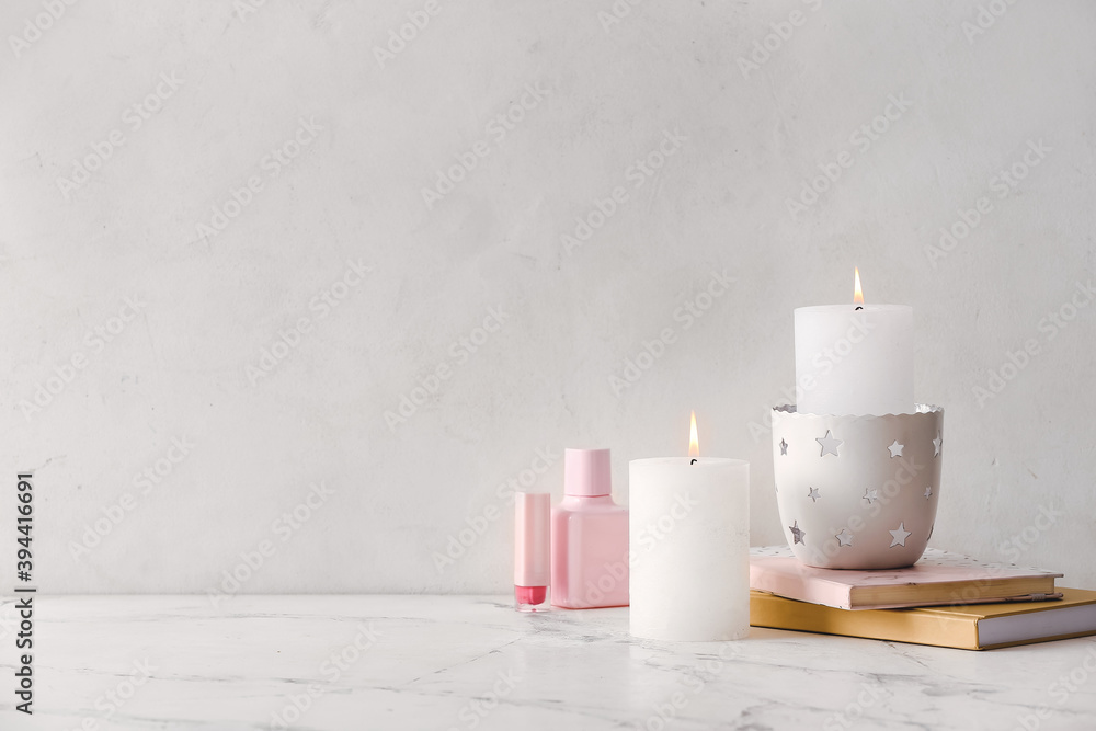 Beautiful aroma candles on dressing table in room