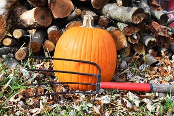 Sticker - Pumpkin and Pitchfork by a Woodpile