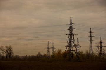 High-voltage lines at dawn or dusk