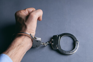 men handcuffed in criminal concept