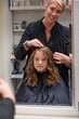 © Johnér - Girl having her hair cut, Sweden