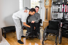 Career Helping Man In Wheelchair, Sweden