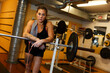 © Johnér - Woman in gym looking at camera, Sweden