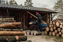 Couple Chopping Wood, Sweden