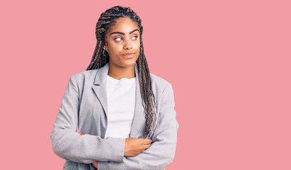 Sticker - Young african american woman with braids wearing business clothes smiling looking to the side and staring away thinking.