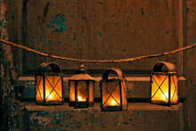 Illuminated Lanterns Hanging On Closed Door