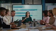 © stockbusters - Top manager female discussing strategy with team. People talking about startup