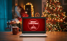 Christmas Wishes On A Laptop And Santa Bringing Gifts At Home