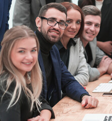 portrait of a happy business team at an office Desk