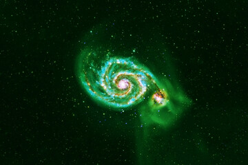 green galaxy in deep space. elements of this image furnished by nasa