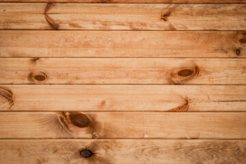 Wood wall background texture. Natural pattern of wood. Backdrop for design purposes. Wooden planks. Yellow brown color tone wood.