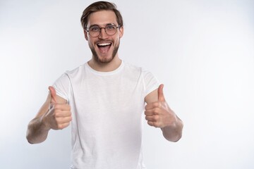 Sticker - Happy man giving thumbs up sign isolated on white background.