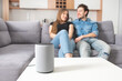 © Proxima Studio - Couple talking command to smart speaker