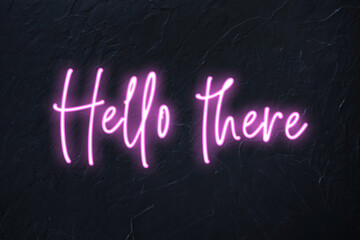 Hello there written in pink neon style on black wall background