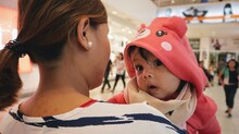 Close-up Of Mother And Daughter In Shopping Mall