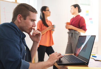 Young man working on laptop