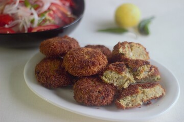 Wall Mural - Kerala style deep fried chicken cutlets served with onion tomato salad