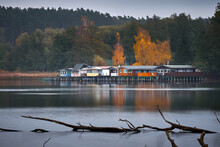 Lake In Autumn With Boathouses