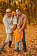© alfa27 - family in autumn forest, spend free time together outdoors on fresh air, posing at camera, walk.