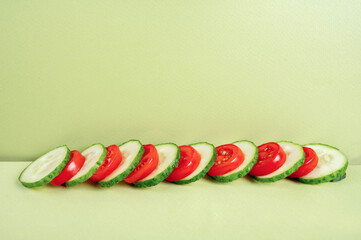 Сomposition of slices of cucumber and tomato