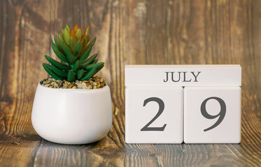 Flower pot and calendar for the warm season from 29 July. Summer time.