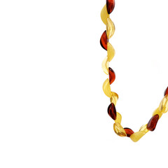 Wall Mural - Amber necklace isolated on a white background