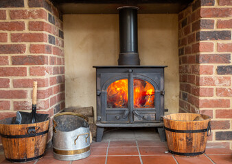 traditional wood burner and coal bucket