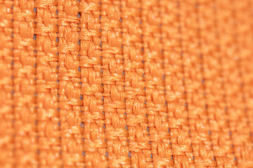 Macrophotography of fabric texture abstract background close up view.