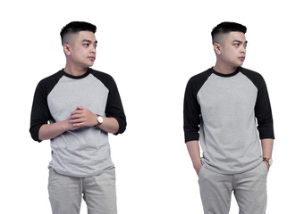 Wall Mural - Young man with raglan t shirt in black heather grey color in isolated on white background