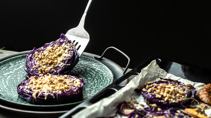 Close up roasted balsamic thyme red cabbage, quince and apples, Vegan baked red cabbage steaks, Food recipe background