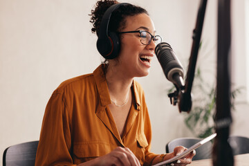 Wall Mural - Woman enjoying podcasting from home